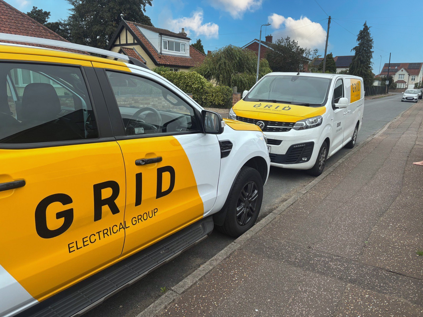 GRID Electrical vans in a Norfolk street